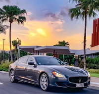 Maserati Quattroporte Limousine Transfer Cairns Airport to City - VIC Tourism