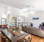 Unit 4 Rainbow Surf Modern double storey townhouse with large shared pool close to beach  shop