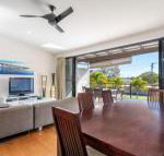 Unit 3 Rainbow Surf Modern double storey townhouse with large shared pool close to beach  shop