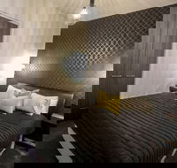 Indulge Apartments CBD