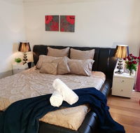 GIRLS ONLY. Large bedroom with KING bed close to everything - VIC Tourism