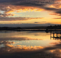 Reflections on Merimbula Lake - VIC Tourism