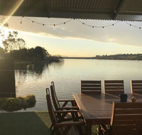 Shack built over the Murray River - VIC Tourism