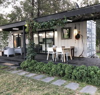 Absolute riverfront shipping container cabin - VIC Tourism
